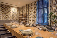 Vergaderen in een retro huiskamer Vergaderen in een retro huiskamer