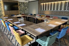 Vergaderen op de boulevard met zeezicht Vergaderen op de boulevard met zeezicht