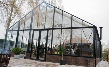 Vergaderen in een Victoriaanse kas Vergaderen in een Victoriaanse kas