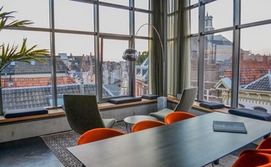 Vergaderen in een Glazen koepel Vergaderen in een Glazen koepel