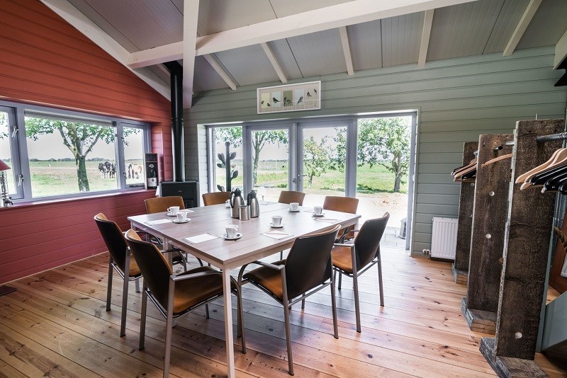 Vergaderen in een voormalige varkensstal